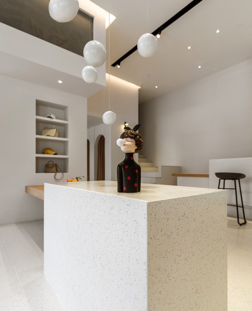 深圳市龍崗區(qū)橫崗現(xiàn)代風(fēng)女裝店pin Xi「暗香 女裝」裝修設(shè)計大理石島臺