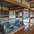 時間谷創(chuàng)意大廈日式原木風辦公室裝修方案 超大圓形造型鏡
